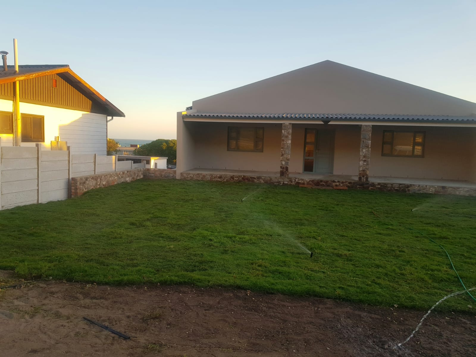 Landscaping project with new lawn